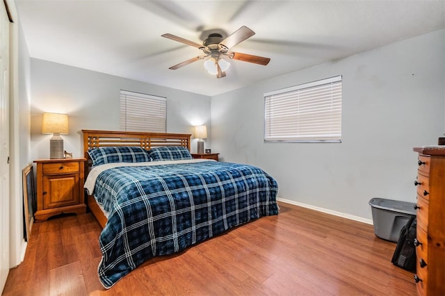 bedroom featuring ceiling fan and hardwood / wood-style floors