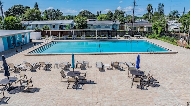 view of swimming pool featuring a patio area