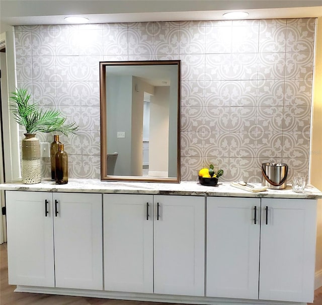 bathroom featuring hardwood / wood-style flooring