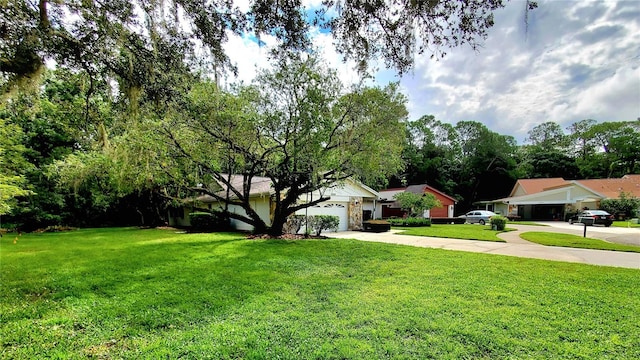 view of yard featuring a garage