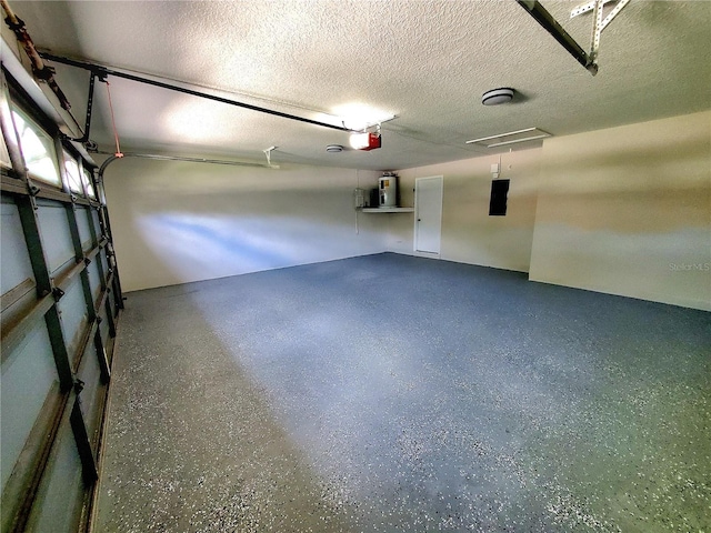 garage with a garage door opener and electric water heater