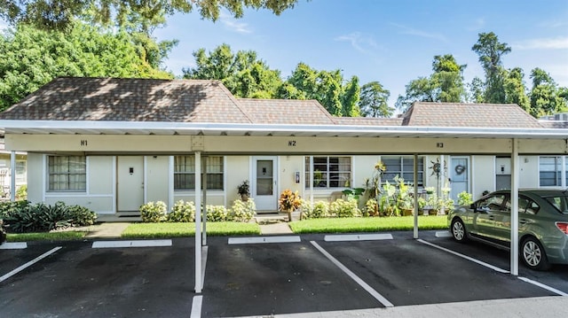 exterior space featuring a carport