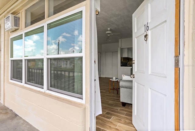 interior space with a wall mounted AC