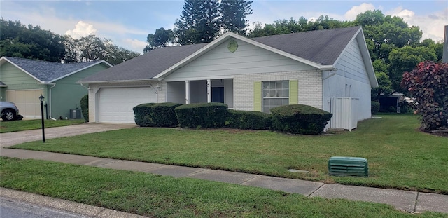 single story home with a garage and a front yard