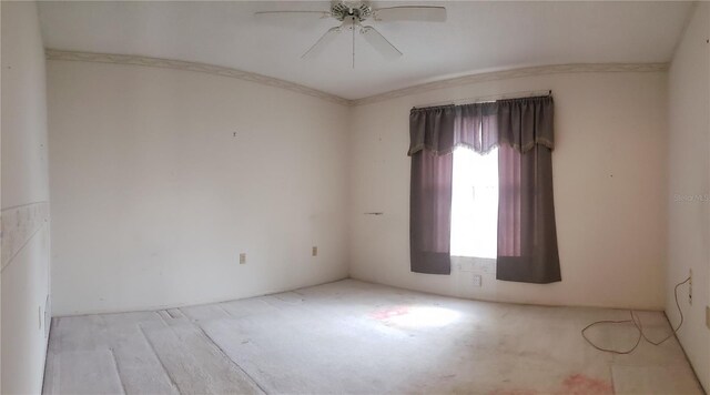 unfurnished room with ceiling fan