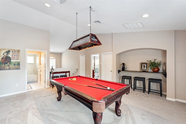 game room featuring light colored carpet, lofted ceiling, and billiards