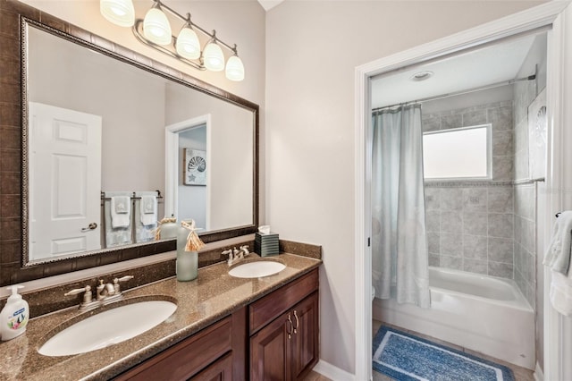 bathroom featuring shower / bath combination with curtain and vanity