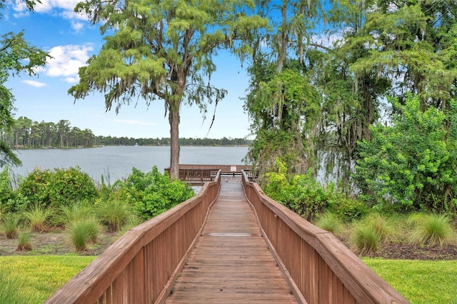 view of home's community with a water view