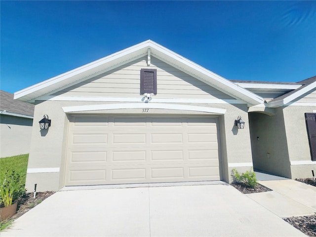 garage with driveway