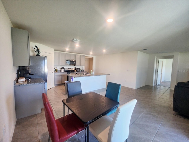 dining room with recessed lighting, visible vents, and light tile patterned floors