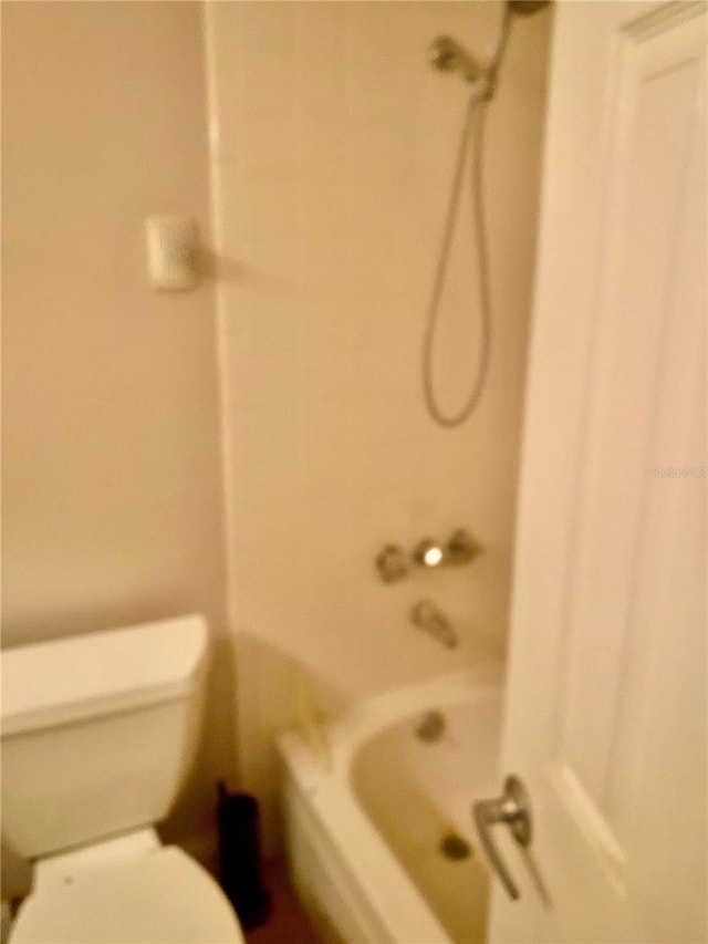 bathroom with  shower combination and toilet