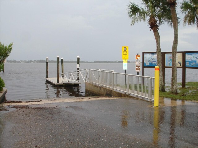 dock area with a water view