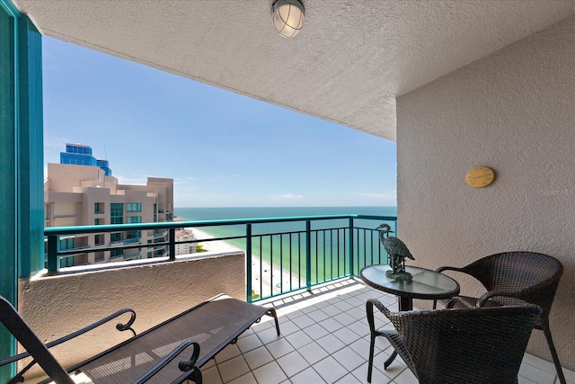 balcony featuring a water view