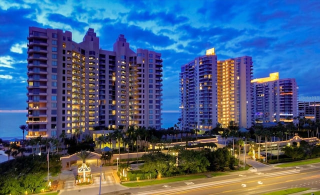 view of outdoor building at dusk