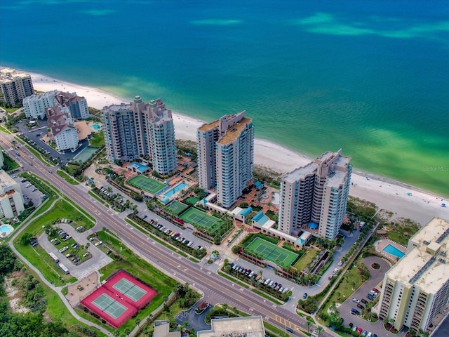 bird's eye view with a view of the beach and a water view