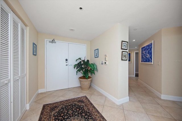 entrance foyer featuring light tile patterned flooring