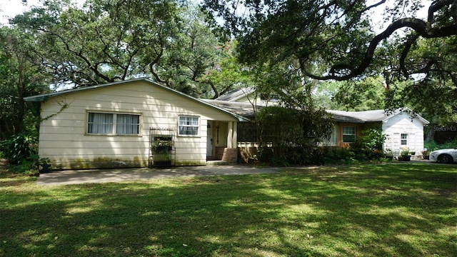 exterior space with a yard