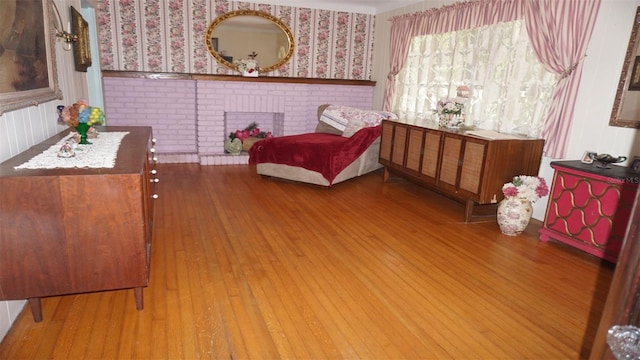 living area with wood-type flooring