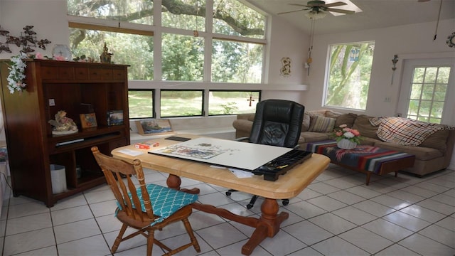 tiled home office featuring ceiling fan