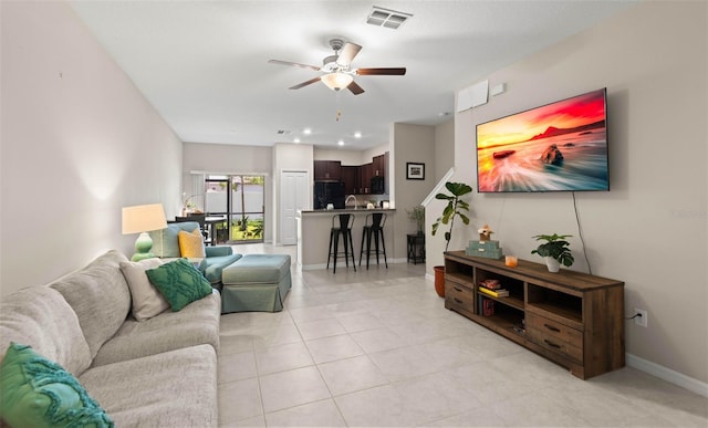 7203 Sweet Alyssum Ct, Tampa, FL 33619 - living area featuring visible vents, baseboards, recessed lighting, a ceiling fan, and light tile patterned floors