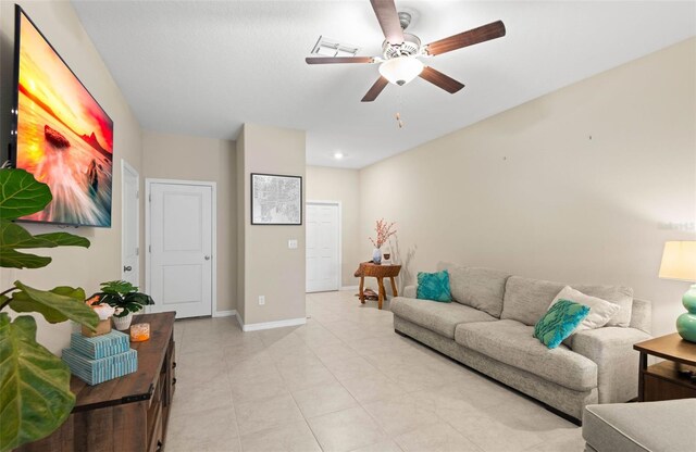 living room with ceiling fan