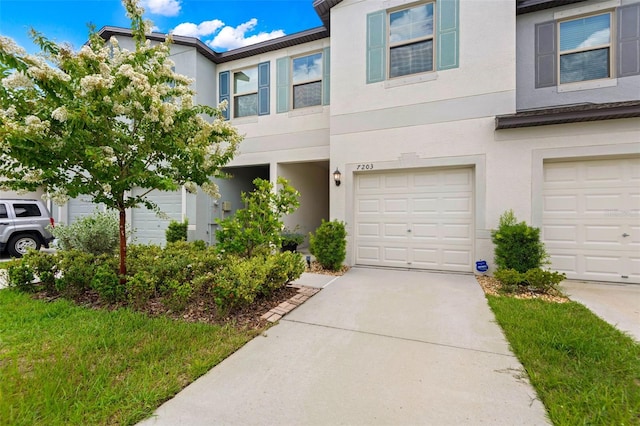 view of property with a garage