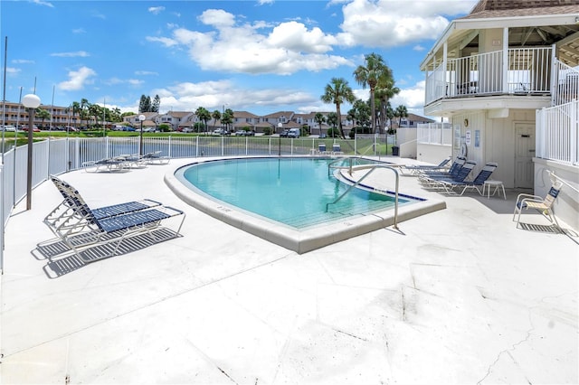 view of swimming pool featuring a patio