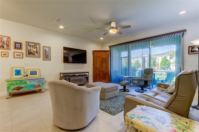 tiled living room featuring ceiling fan