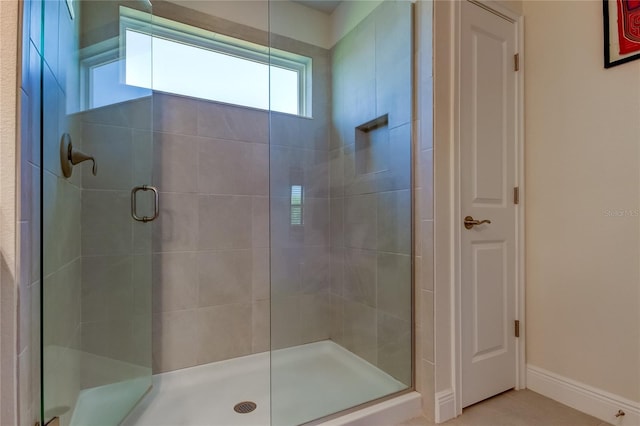 bathroom with an enclosed shower