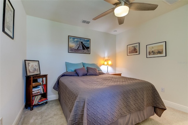 bedroom featuring ceiling fan and light colored carpet