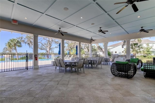 view of patio / terrace featuring a community pool and ceiling fan