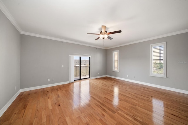 unfurnished room featuring crown molding, plenty of natural light, ceiling fan, and light hardwood / wood-style floors