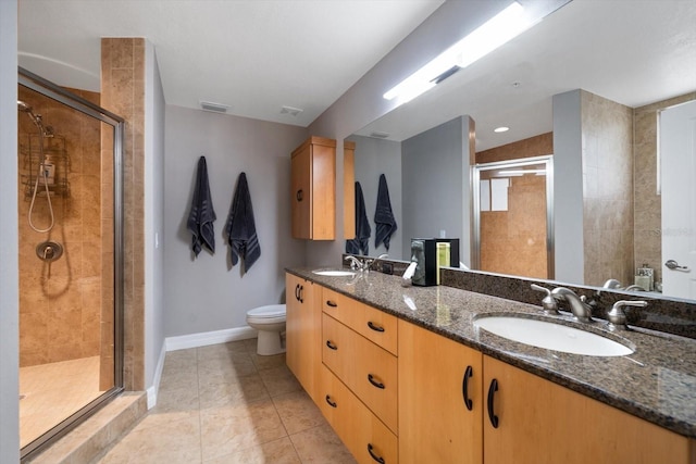 full bath with a stall shower, visible vents, a sink, and tile patterned floors