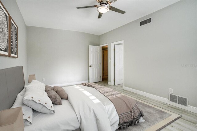 bedroom featuring light wood-type flooring and ceiling fan