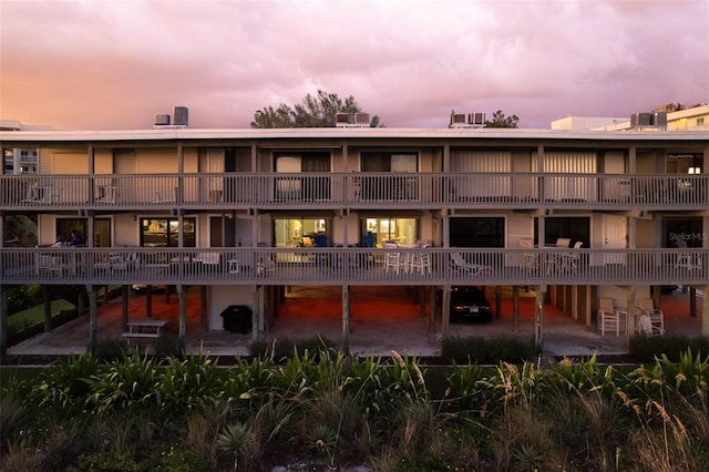 view of outdoor building at dusk