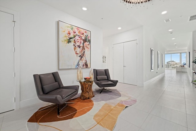 sitting room with light tile patterned floors