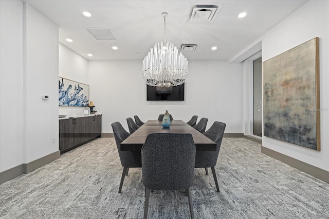 dining area featuring a chandelier