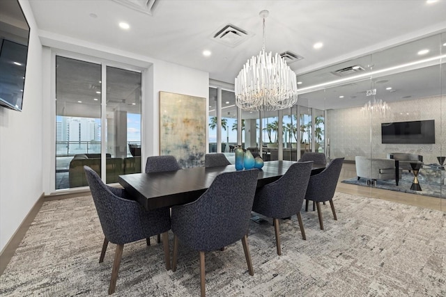 dining room with a chandelier