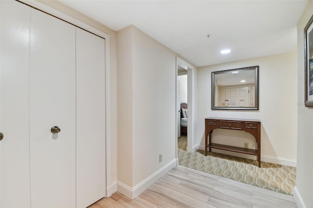 hallway featuring light hardwood / wood-style floors