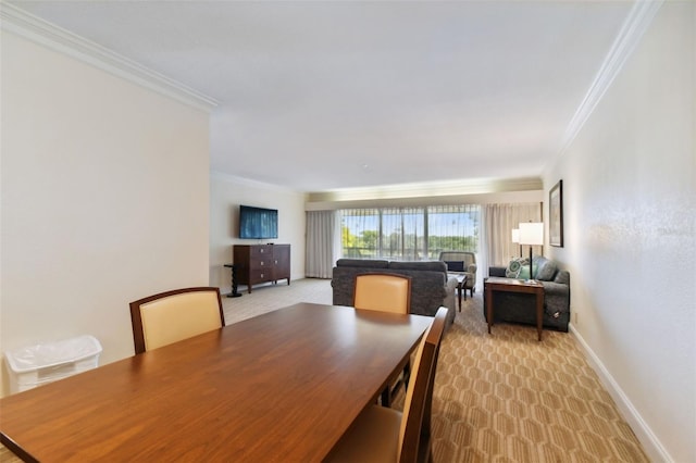 dining space with light carpet and crown molding