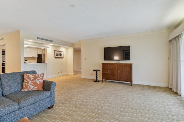 living room with ornamental molding, a textured ceiling, and light colored carpet