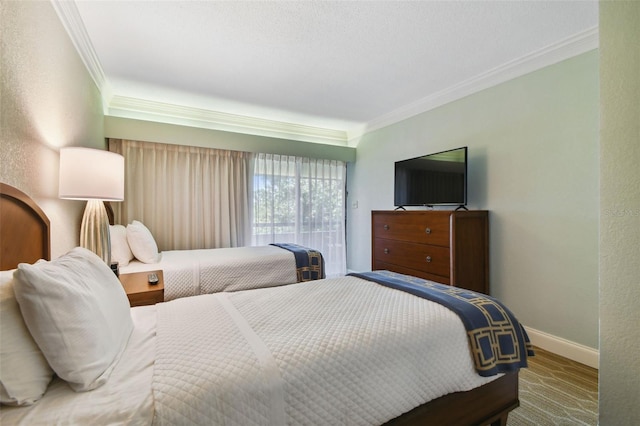 bedroom featuring crown molding