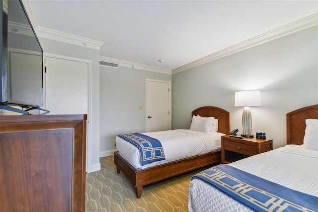 bedroom with crown molding