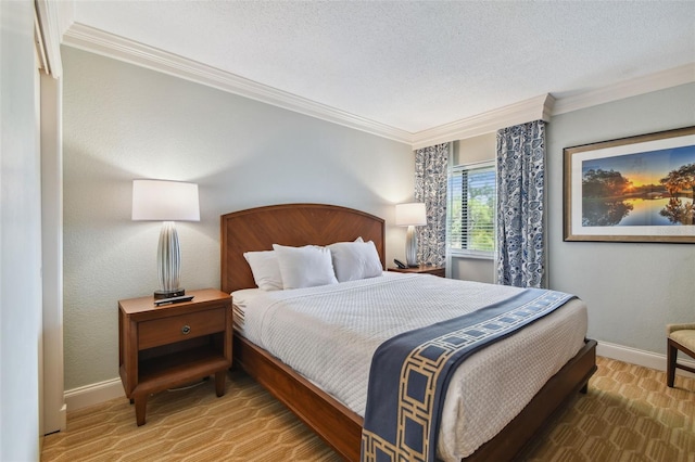 carpeted bedroom with ornamental molding and a textured ceiling