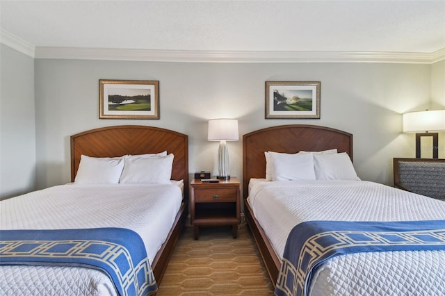 bedroom with crown molding