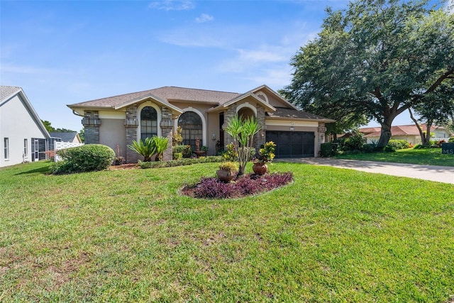 view of front facade with a garage and a front yard