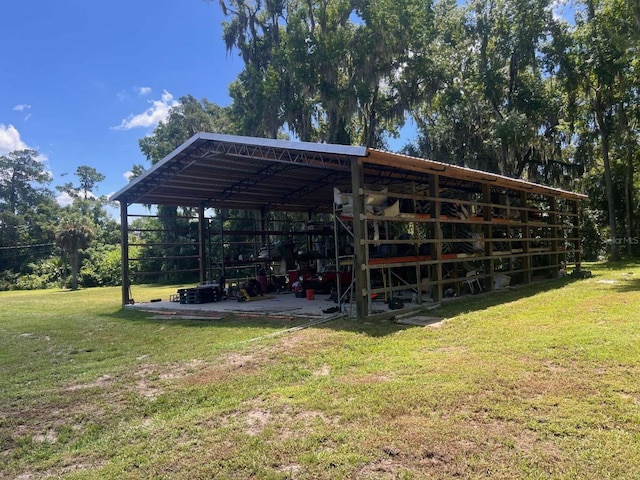 view of outdoor structure with a lawn