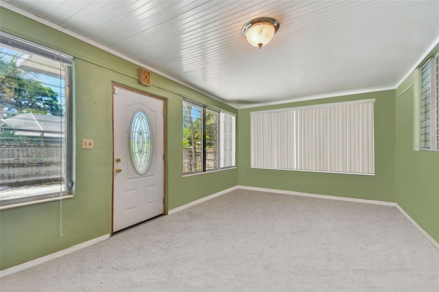 entryway featuring carpet flooring