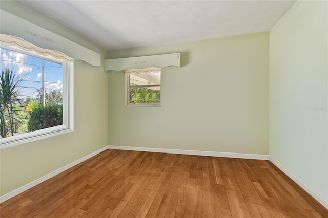 spare room with light wood-type flooring