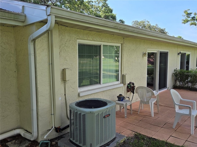 view of patio with central air condition unit